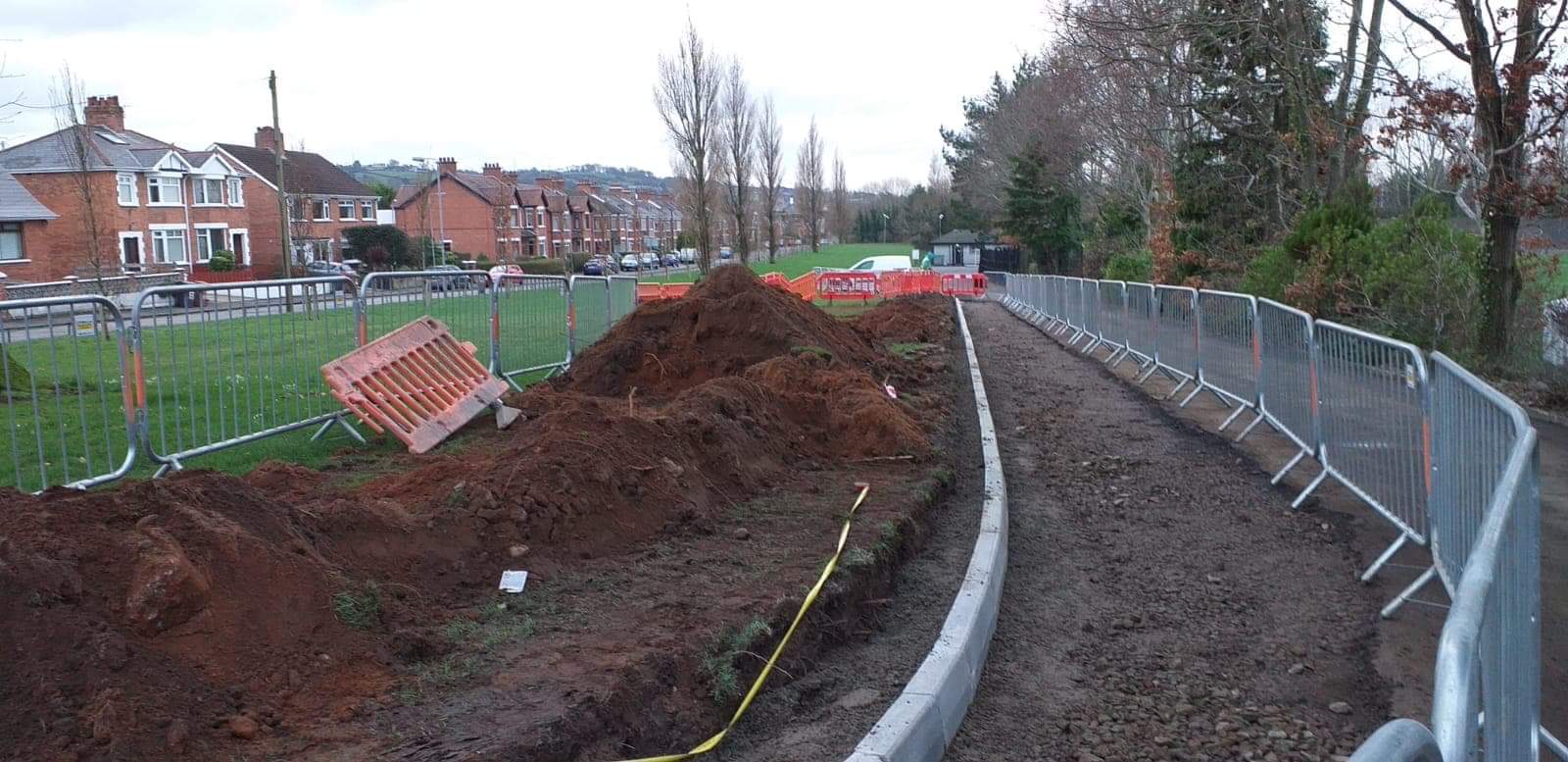 A new kerbed path and edging through a parkland setting.