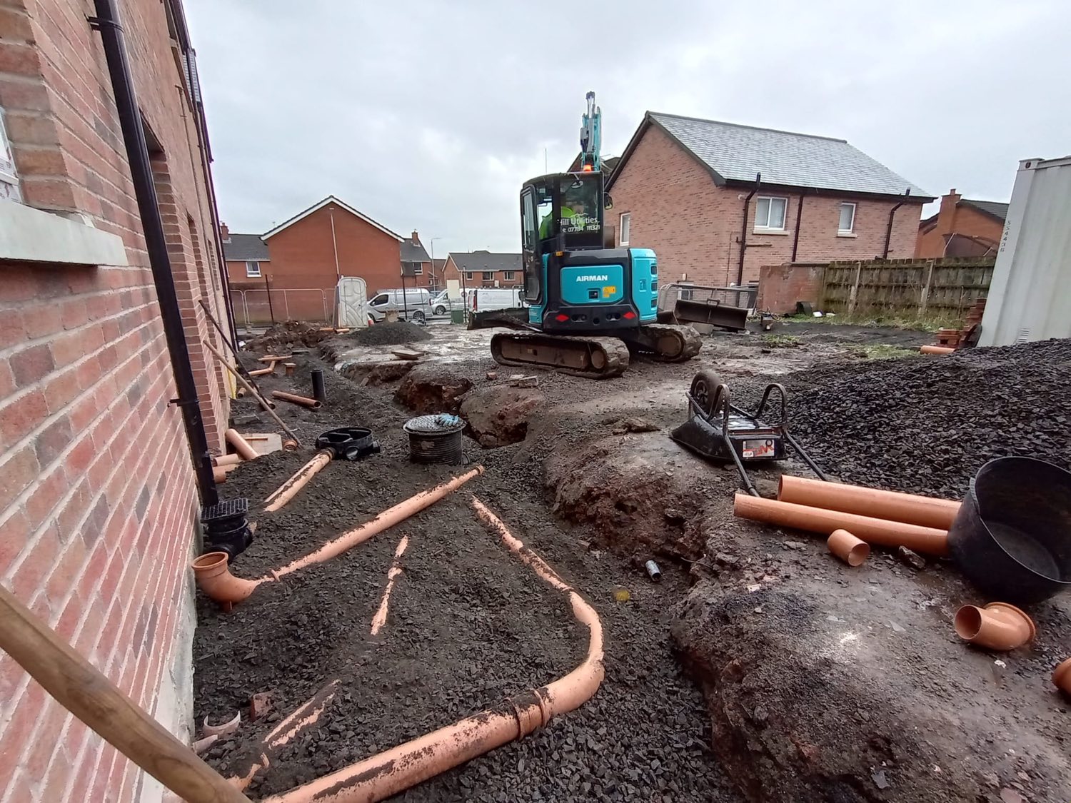 Soil and drainage pipes set out across a new housing development.