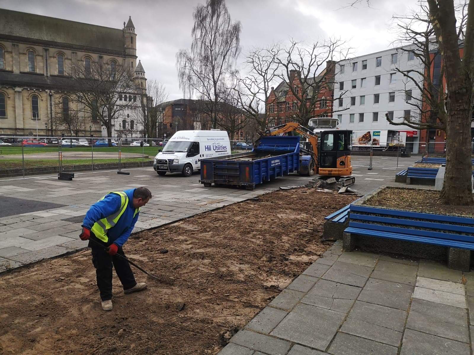 Commercial groundworks under way in a city-centre public space.