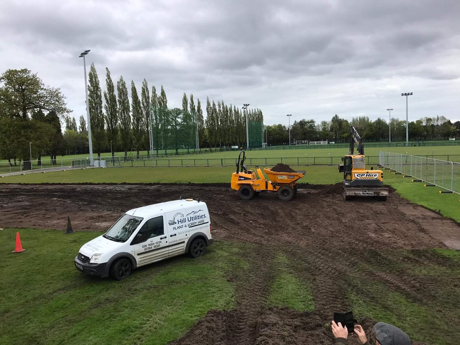 Hill Utilities plant carrying out groundworks on a sports pitch.